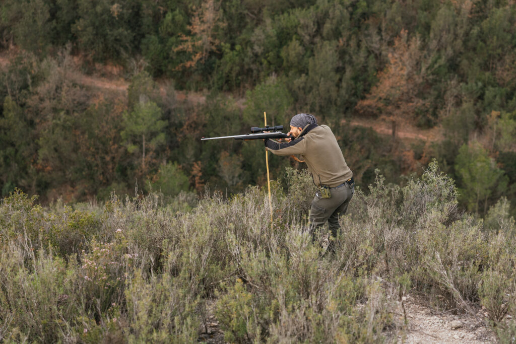 Hunter Aiming With Rifle In Forest Landscape 2025 01 10 05 17 38 Utc Scaled